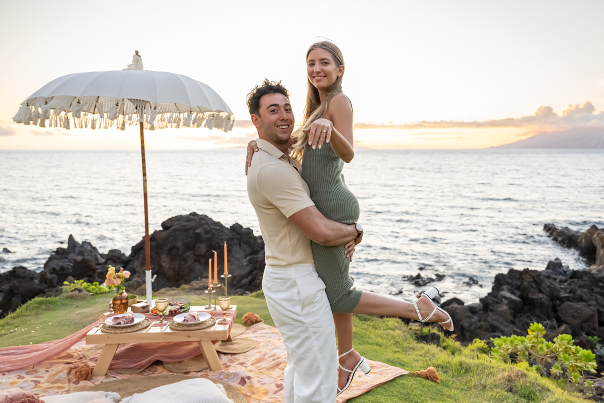 Couple lift photo engagement, sunset, Maui